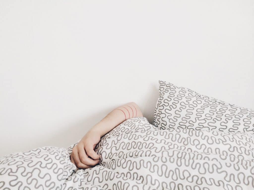 person sleeping in a bed