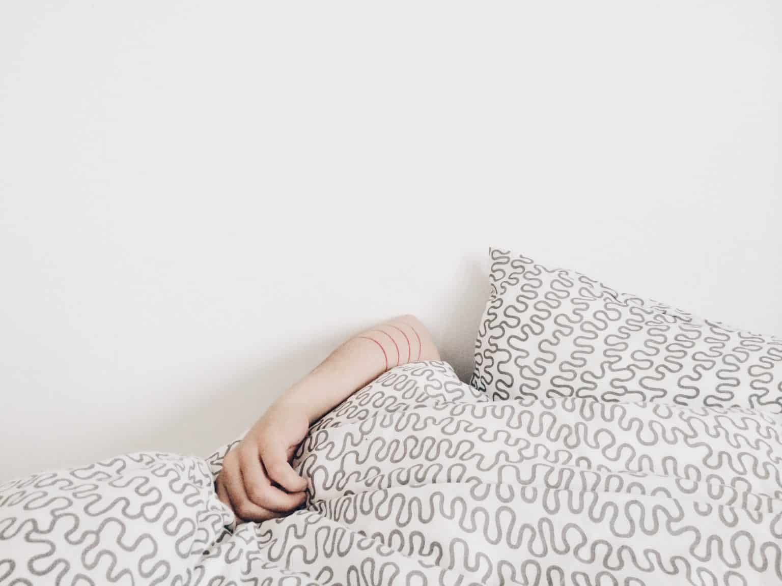 person sleeping in a bed