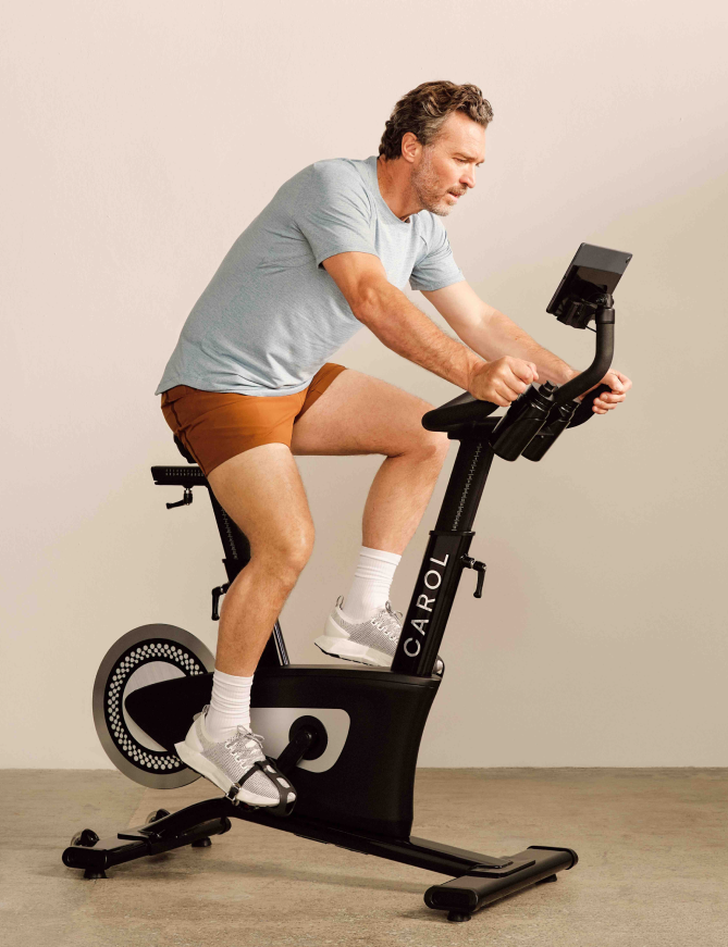 Man riding a CAROL bike